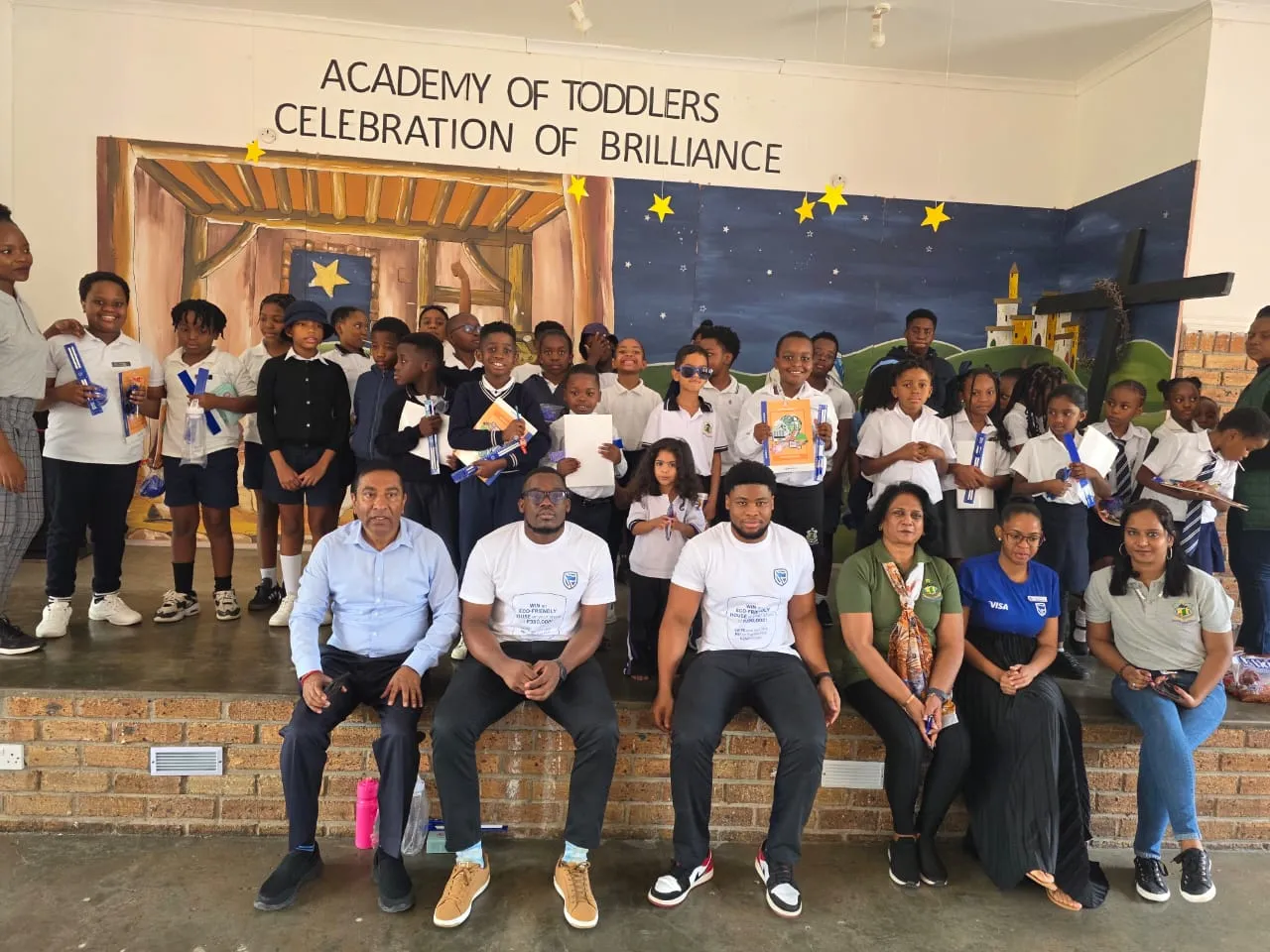 AOT students and workshop facilitators celebrating together